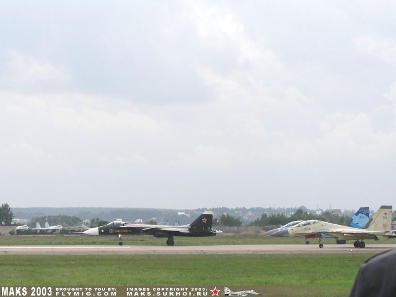 Su-47, Su-27UB and Su-30MK rolling.