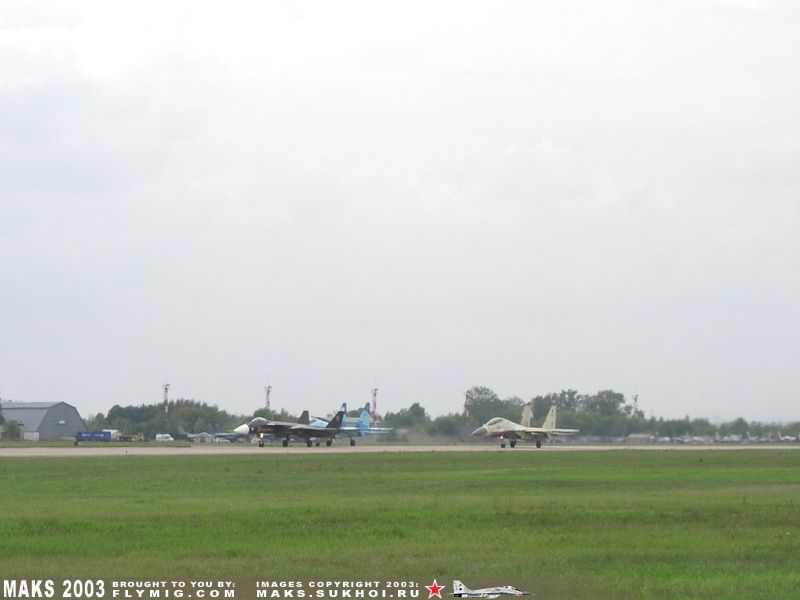 Su-47, Su-27UB and Su-30MK taking-off.